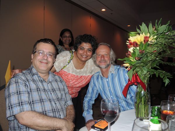 Orion Shirihai, Shilpa Iyer and Erich Gnaiger at the Gala Dinner with the Bouquet for Dr. Charles Hoppel, who celebrated his 54th wedding anniversary on this day