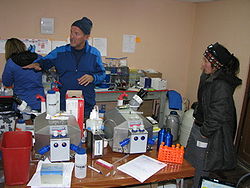 Rob Roach explains the AltitudeOmics 2012 project, with the two Oroboros O2k at 5,200 m in one of the labs at Chacaltaya, Bolivia. Dr.a Isabel Moreno (right) belongs to the physics staff of the Chacaltaya laboratory (Jul/Aug 2012).